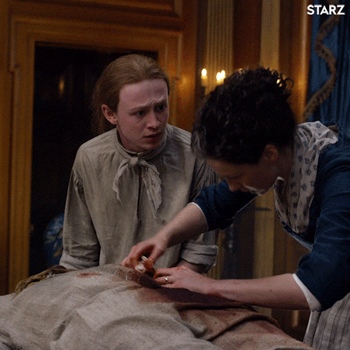 Ian, assisting Claire with the emergency surgery on Rufus.