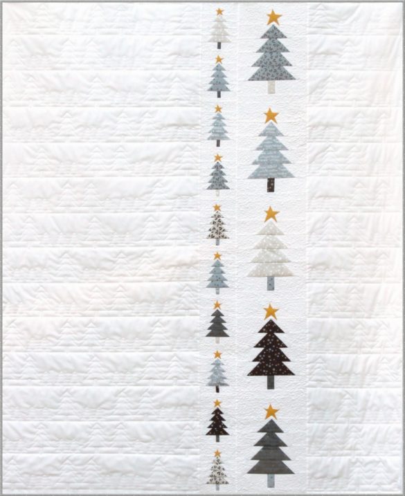 Those Christmas Trees pattern by zen chic: A white quilt with grey and light blue christmas trees in a vertical pattern on one side, with rows of evergreen trees quilted into the white fabric.