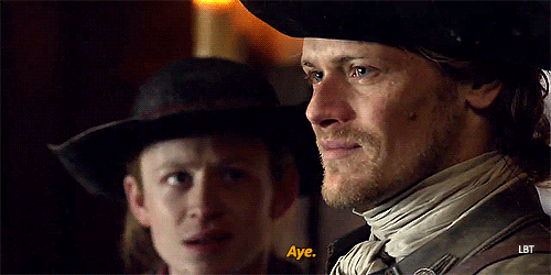 Jamie smiling at Murtagh. Saying Aye with tears in his eyes