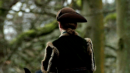 Willie riding away, but looking back to Jamie and Claire.
