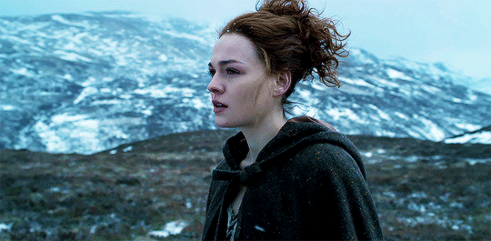 Brianna amidst the background of a glorious and cold Scotland.