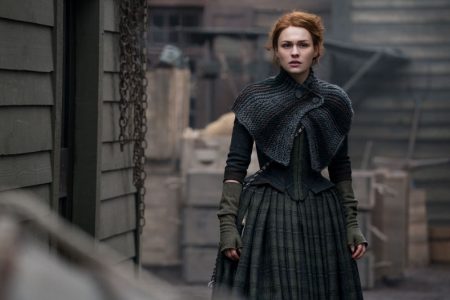 Bree stands in the street wondering where Roger fucked off to, but really the shot is about her cowl