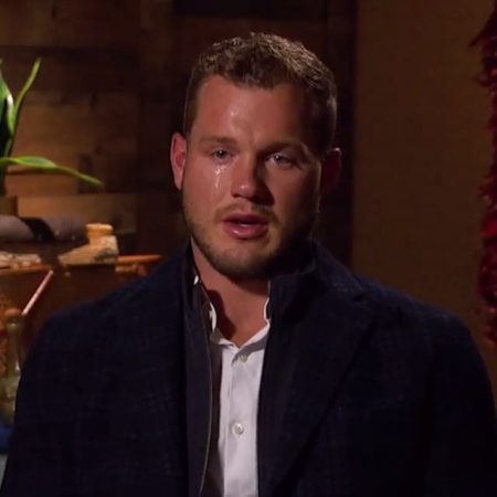 Colton talks to the camera while crying