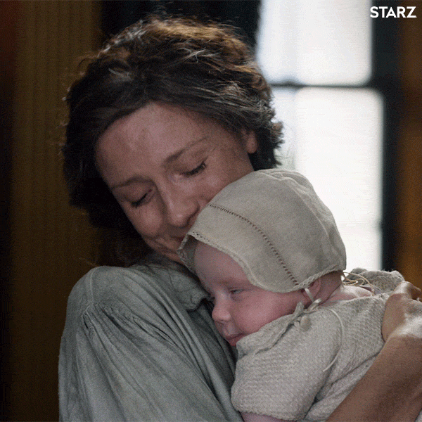 Claire cuddles her grandson