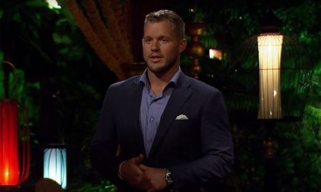 Colton is wearing a blue suit and blue shirt. He looks worried.