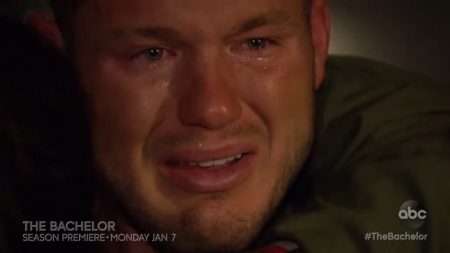 A close up of Colton crying