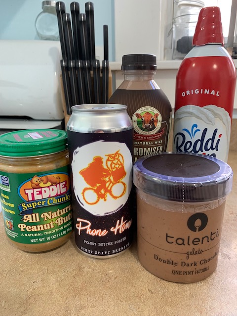 Ingredients for a chocolate peanut butter milkshake