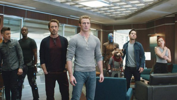 Avengers still: Clint, Rhodie, Stark, Chris Evans and his henley, Nebula, Rocket, Ant Man and Black Widow standing and looking very pensive possibly emo