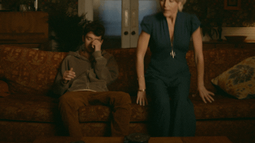 A gif of Otis and his mom sitting on the couch