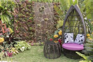 Cozy seat in beautiful backyard flower garden