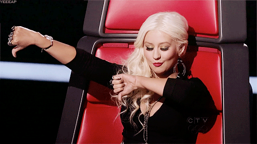 Christina Aguilera says boo and gives a thumbs down