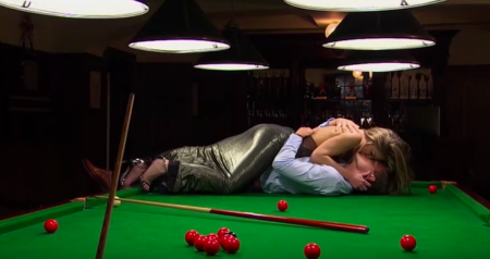Peter and Hannah make out on a pool table. 