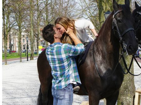 Tyler kisses Hannah who is on horseback