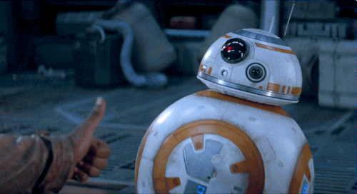 BB8 gives a thumbs up with a blue flame on a stick 