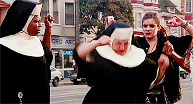 a nun from Sister Act dancing exuberantly