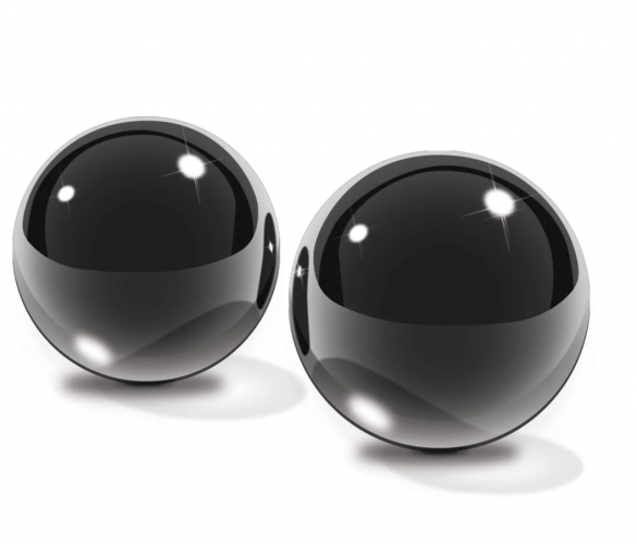 Two shiny black Ben Wa Balls