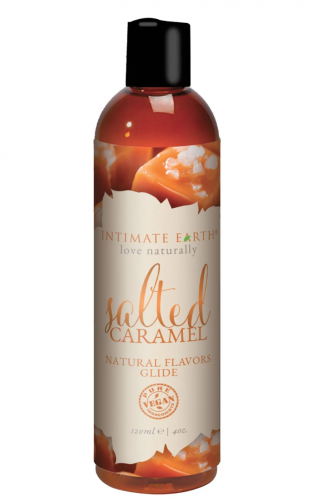 An amber plastic bottle with lubricant and caramels on the label