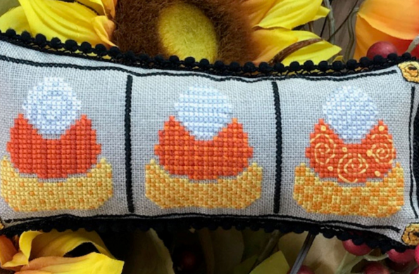 Cross Stitch Candy Corn patterned pillow