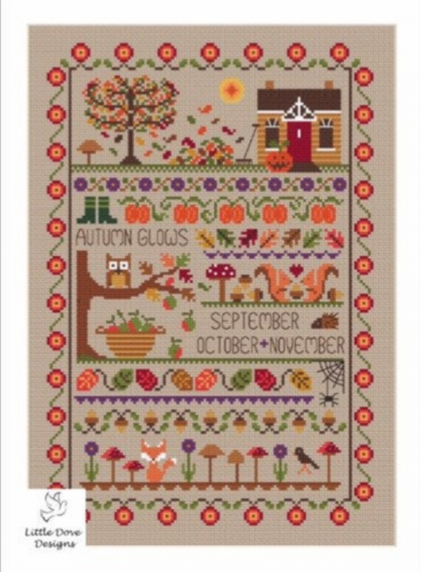 Fall sampler of pumpkins, houses cats and trees with the word Autumn Glows and September October November