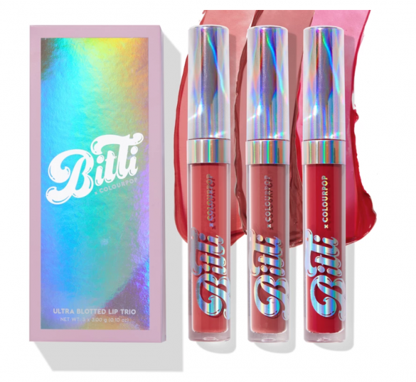 A set of three lip gloss tubes with a holographic lid onthe box