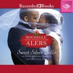 A Black couple kissing beneath the bride's wedding veil, which is blowing around them 