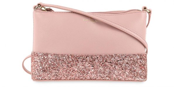Light pink cross body bag with glitter on the bottom third 