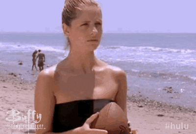 Buffy throws a football and knocks a guy flat on his back