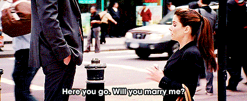 Sandra Bullock proposing marriage to Ryan Reynolds