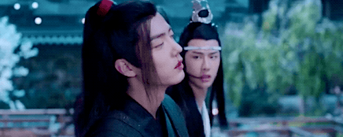 Wei Wuxian faints dramatically. Lan Zhan catches him.