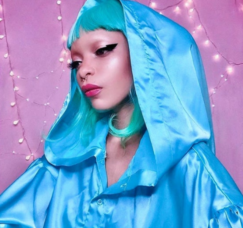 Blue hooded satin blouse with long puffy sleeves and cropped length in a vivid aqua blue 