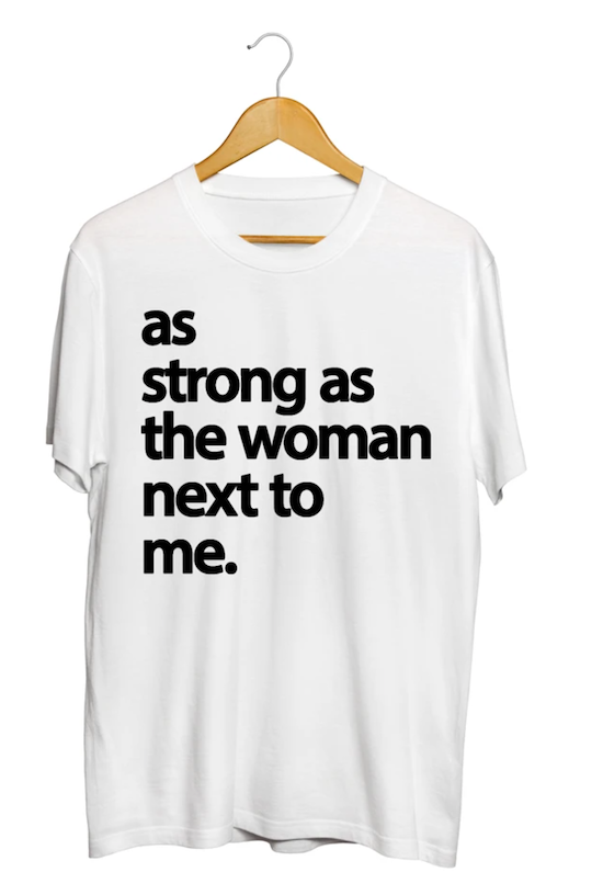 shirt printed with the words As strong as the woman next to me 