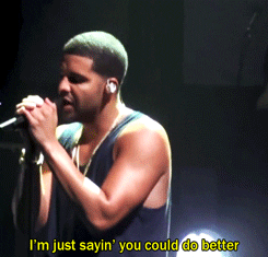 Drake at a concert singing "I'm just sayin you could do better"