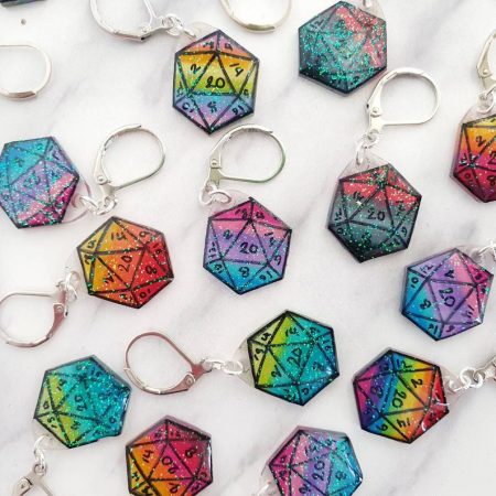 stitch markers shaped like 20 sided dice in rainbow colors.