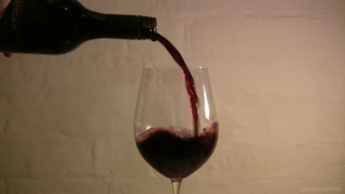 wine being poured into a glass