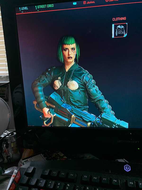 a computer game character with green hair and bangs, a giant gun wearing a leather jacket but due to the cyberpunk glitches her breasts just pop out of the jacket chest like holes were cut in the leather it is RIDICULOUS