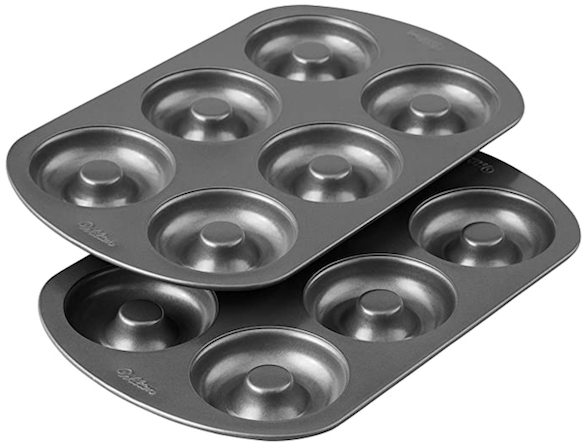 Two nonstick donut baking pans each making six donuts 