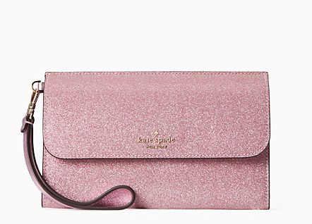 Pink glitter fold over wristlet meant to hold phone, essentials and more in sparkly pink style