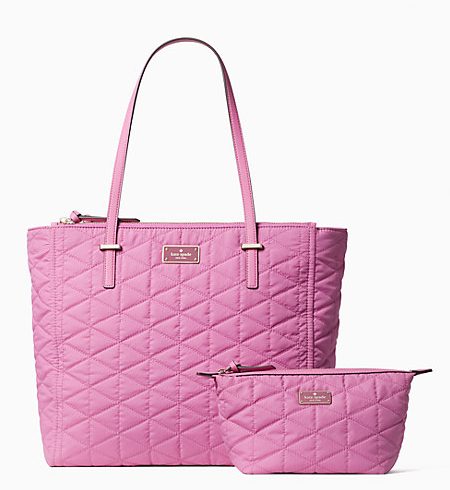a bright pink quilted shoulder tote bag with a matching zip top pink quilted smaller bag to match 