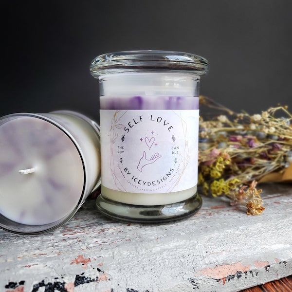 Icey Designs Self Love candle with purple wax marbled in white in a glass jar
