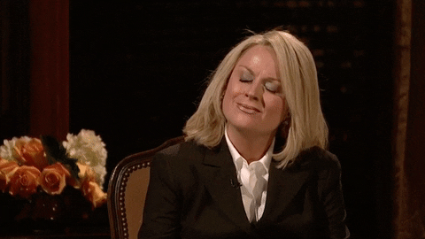 Amy Poehler stares and blinks
