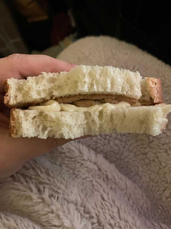 A close up of Amanda's peanut butter and mayo sandwich