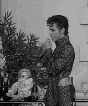 a slow close up of Prince in black and white where at the end he pretty much eye fucks the camera 