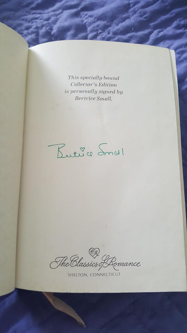The signature page that says this specially bound Colector's Edition is personally signed by Bertrice small - and the signature is in green pen with a heart over the i. 