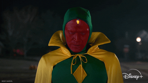 Vision's suit materializes on his body