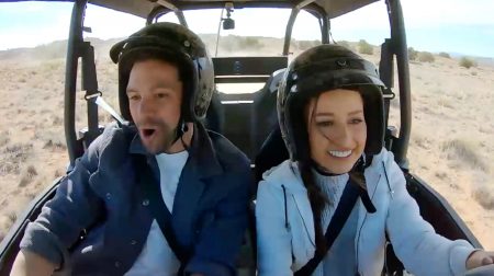 Michael and Katie ride in a dune buggy