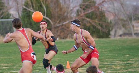 The guys play ball wearing what's essentially a speedo with straps and some knee guards