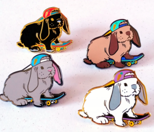 Skater bunnies with different colored hats and boards