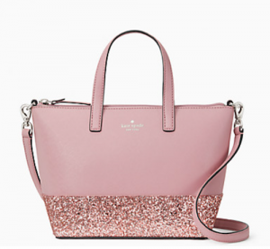 Front image of pink bag with shoulder straps and a glittery lower quarter of the bag