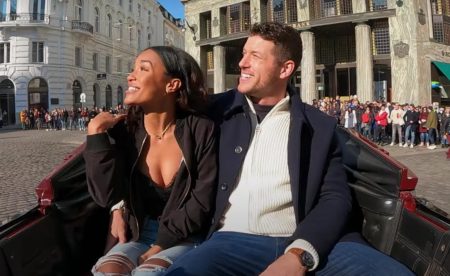 Clayton and Serene ride in a carriage