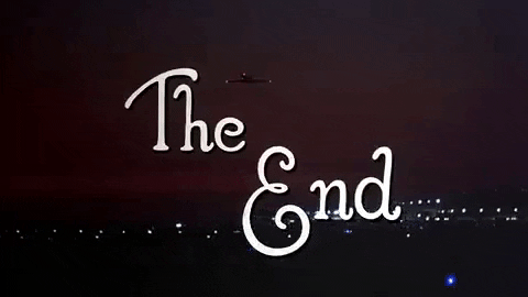 The end graphic at the end of Airplane with fireworks behind the words THE END in White